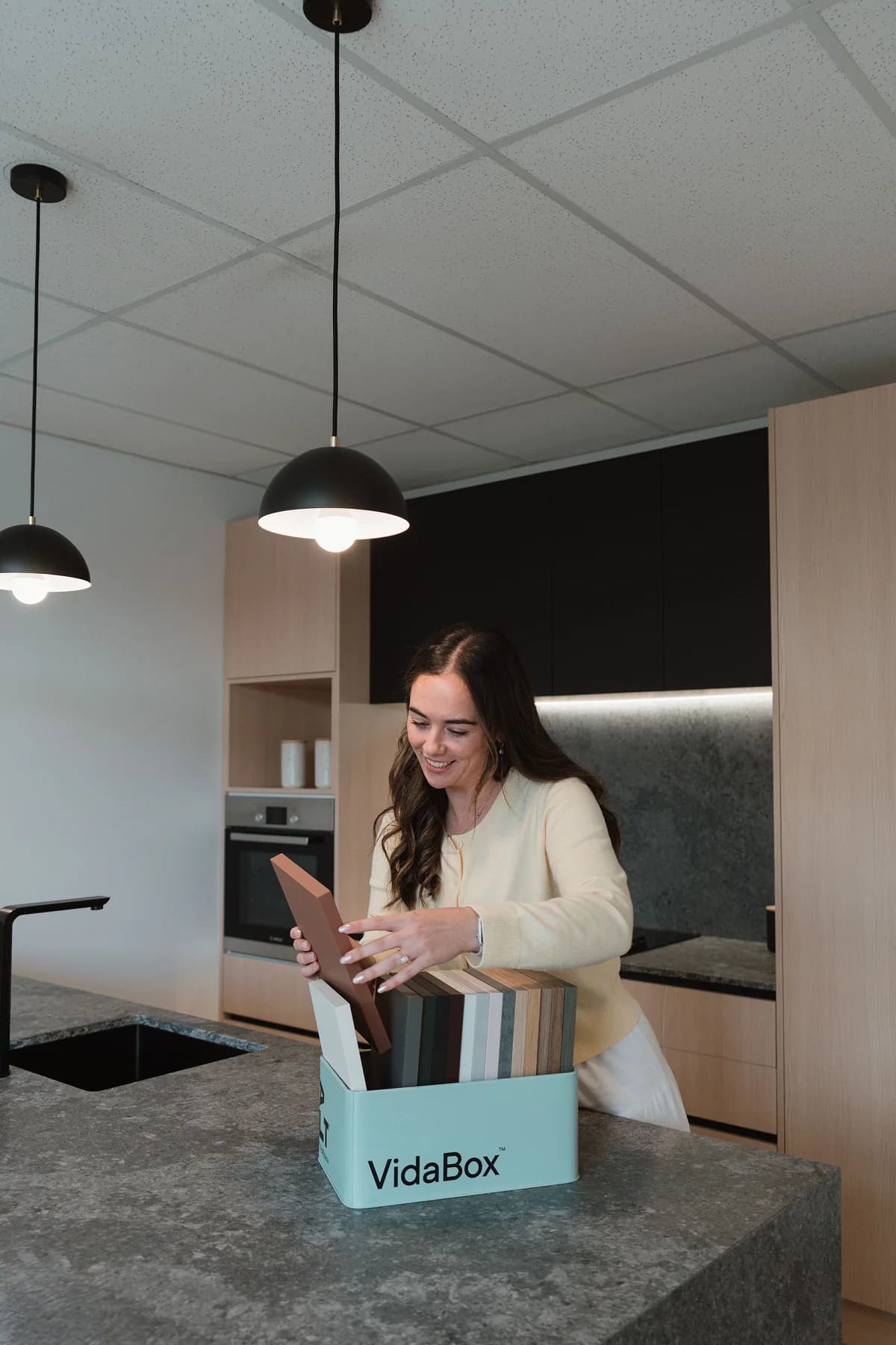 Auckland design team reviewing kitchen plans