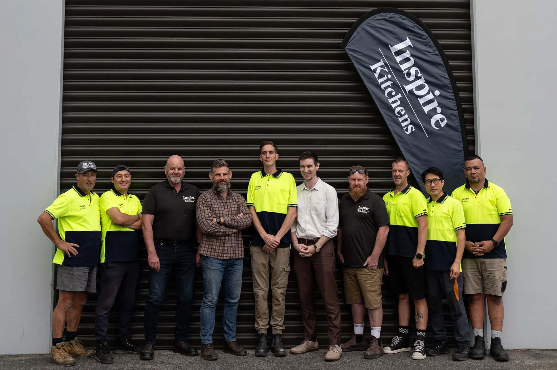 Queenstown team group photo at the showroom
