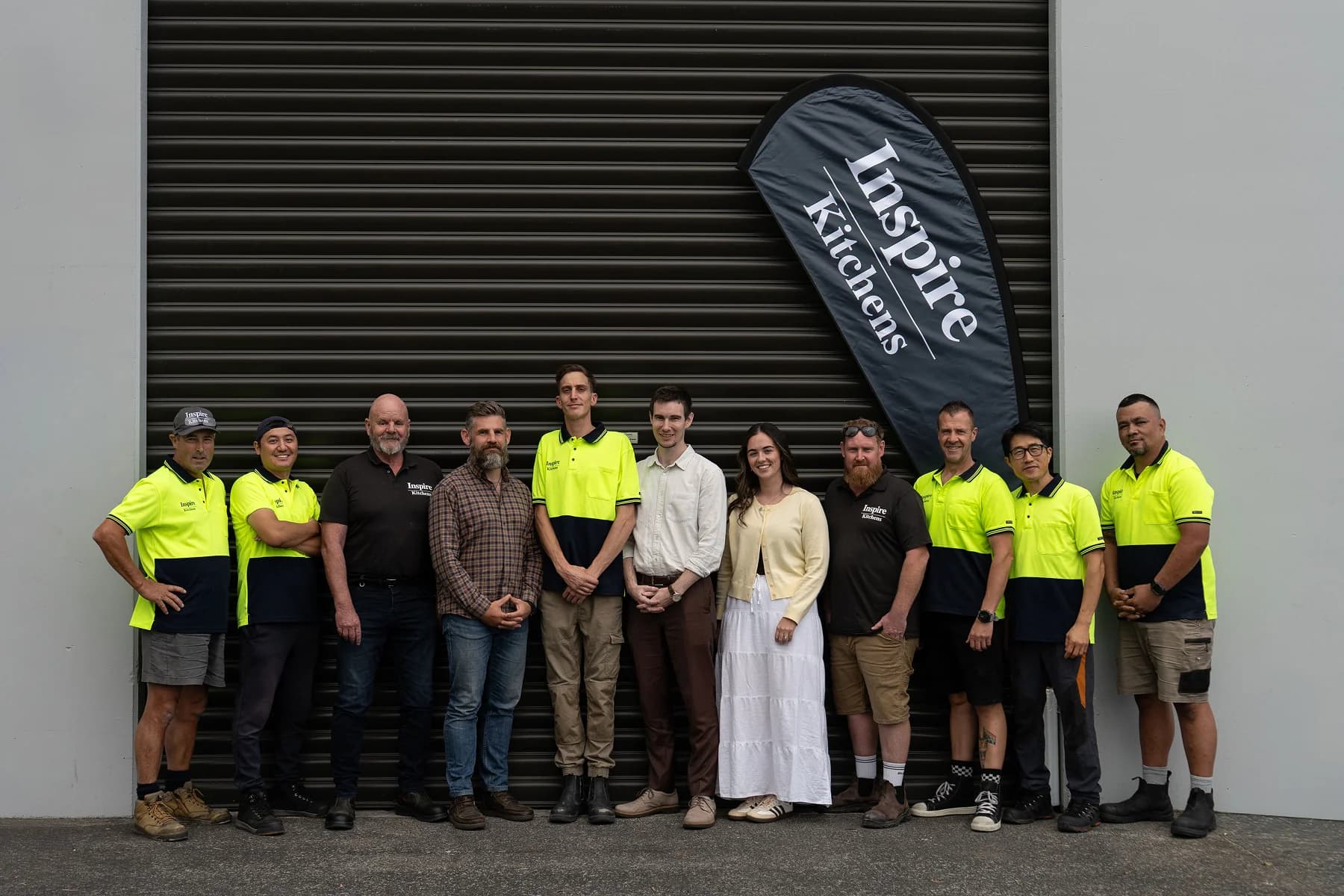 Inspire Kitchens team members collaborating on site