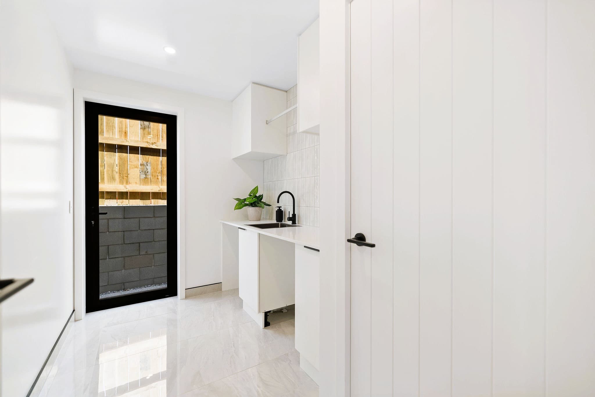 Laundry room with storage