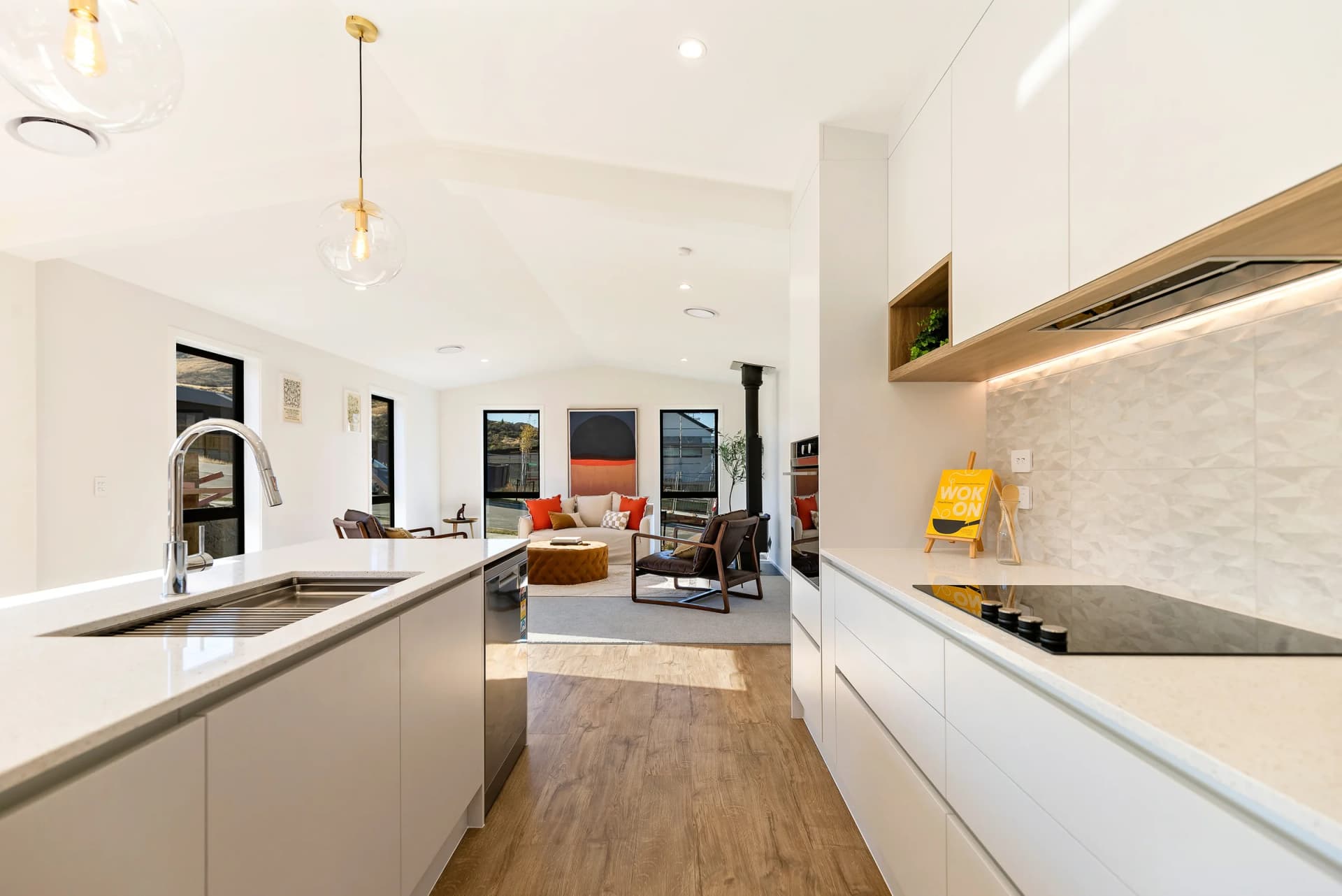 Premium kitchen renovation with new layout and stone benchtop, Auckland homeowner